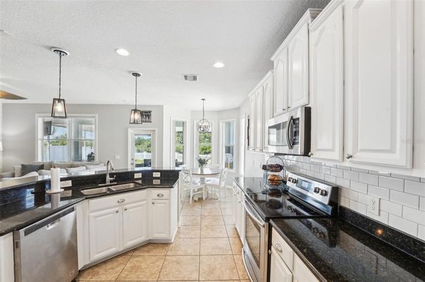 Dining room, Interior, Kitchen, Living room, Pendant Lights, Recessed Lighting, Stainless Steel Appliances