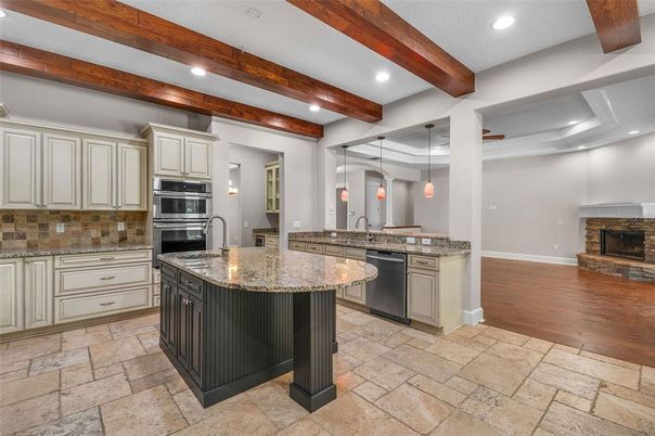 Fireplace, Interior, Kitchen, Pendant Lights, Recessed Lighting, Stainless Steel Appliances, Wooden Beams, Wood Texture Flooring