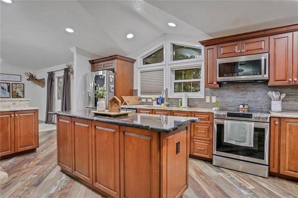 Interior, Kitchen, Recessed Lighting, Stainless Steel Appliances, Wood Texture Flooring