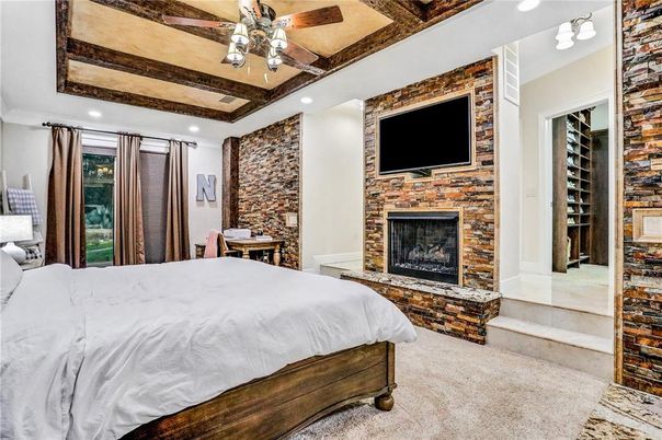 Bedroom, Fireplace, Interior, Recessed Lighting, Stone Walls, Wooden Beams