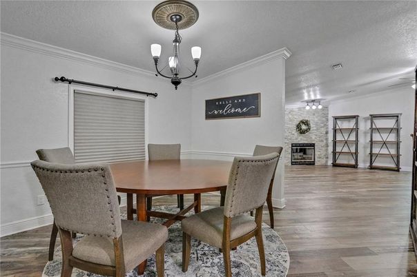 Chandelier, Dining room, Fireplace, Interior, Wood Texture Flooring