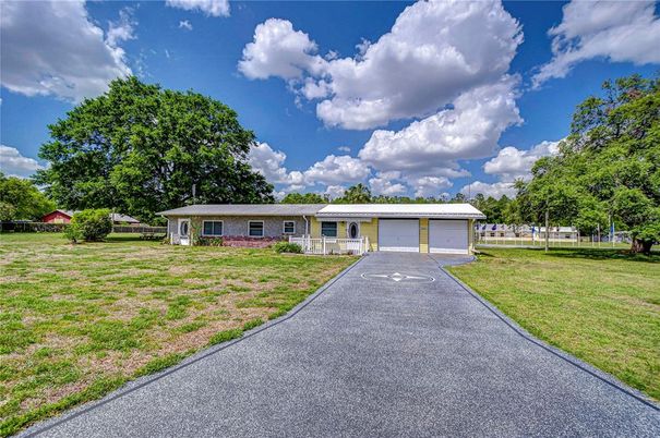 Attached, Backyard, Exterior, Facade, Brick Facade, Ranch