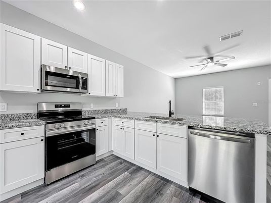 Interior, Kitchen, Recessed Lighting, Stainless Steel Appliances, Wood Texture Flooring