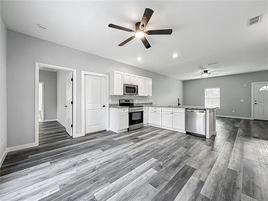 Interior, Kitchen, Recessed Lighting, Stainless Steel Appliances, Wood Texture Flooring