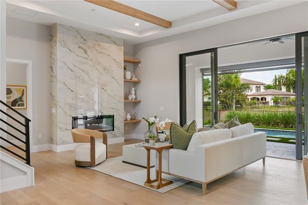 Fireplace, Interior, Living room, Marble Walls, Recessed Lighting, Wooden Beams, Wood Texture Flooring