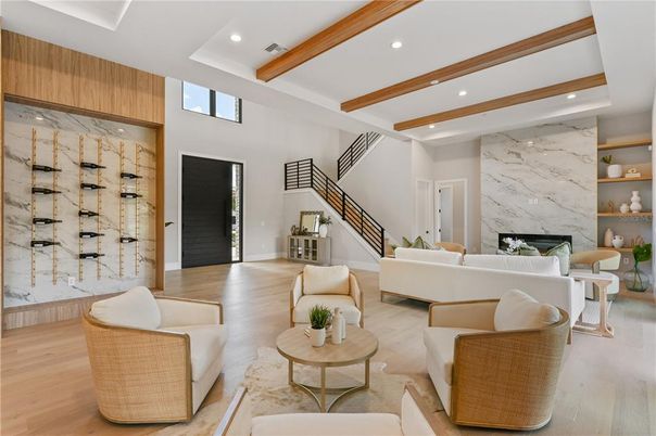 Fireplace, Interior, Living room, Marble Walls, Recessed Lighting, Wine Storage, Wooden Beams, Wood Texture Flooring