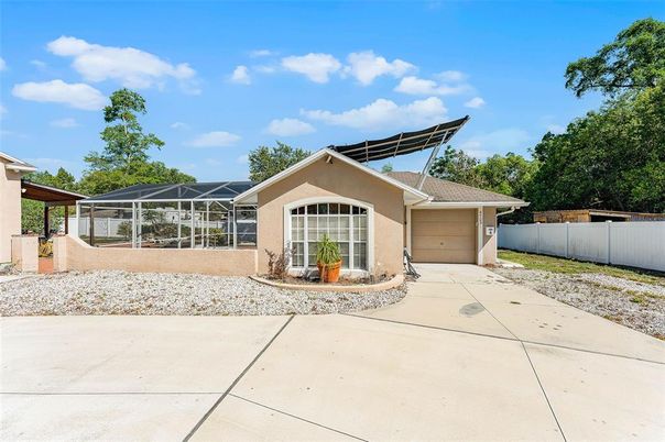 Attached, Exterior, Facade, Solar Panels, Ranch