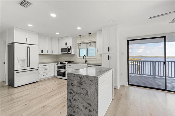 Interior, Kitchen, Pendant Lights, Recessed Lighting, Stainless Steel Appliances, Water, Wood Texture Flooring