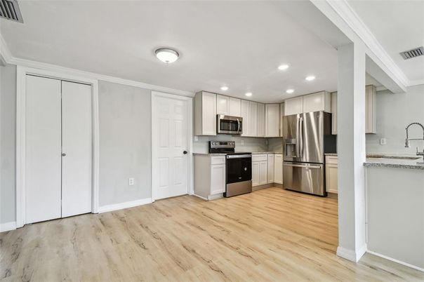 Interior, Kitchen, Recessed Lighting, Stainless Steel Appliances, Wood Texture Flooring