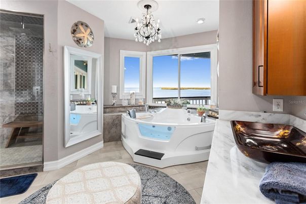 Bathroom, Chandelier, Free Standing Baths, Interior, Recessed Lighting, Water