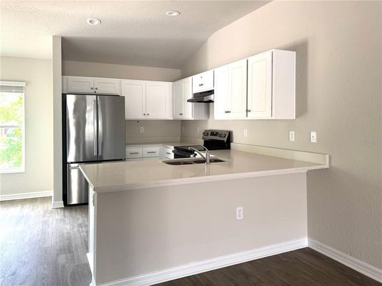 Interior, Kitchen, Recessed Lighting, Stainless Steel Appliances, Wood Texture Flooring