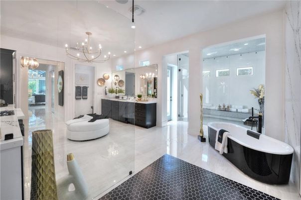 Bathroom, Chandelier, Dual Sink Vanities, Glass Shower, Interior, Pendant Lights, Recessed Lighting