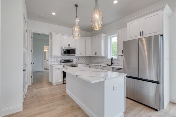 Interior, Kitchen, Pendant Lights, Recessed Lighting, Stainless Steel Appliances, Wood Texture Flooring