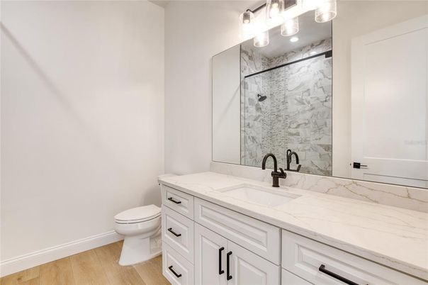 Bathroom, Glass Shower, Interior, Marble Walls, Wood Texture Flooring