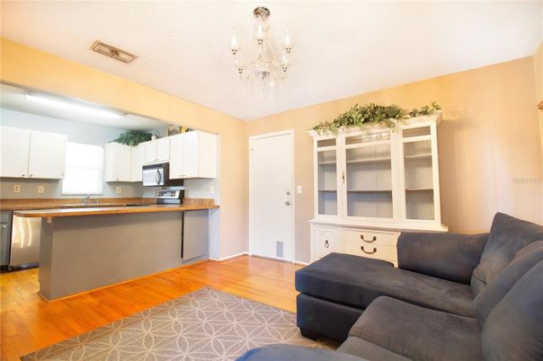 Chandelier, Interior, Kitchen, Living room, Stainless Steel Appliances, Wood Texture Flooring