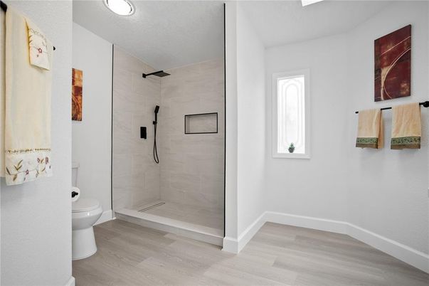 Bathroom, Glass Shower, Interior, Recessed Lighting, Wood Texture Flooring
