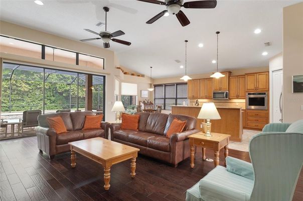 Dining room, Interior, Kitchen, Living room, Pendant Lights, Recessed Lighting, Stainless Steel Appliances, Wood Texture Flooring