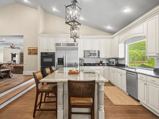 Dining room, Interior, Kitchen, Pendant Lights, Recessed Lighting, Stainless Steel Appliances, Wood Texture Flooring