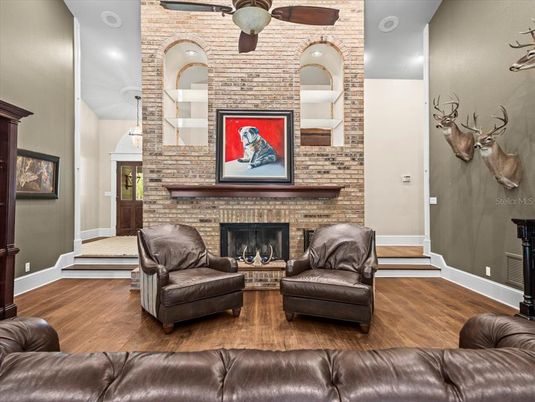 Fireplace, Interior, Living room, Pendant Lights, Recessed Lighting, Stone Walls, Wood Texture Flooring