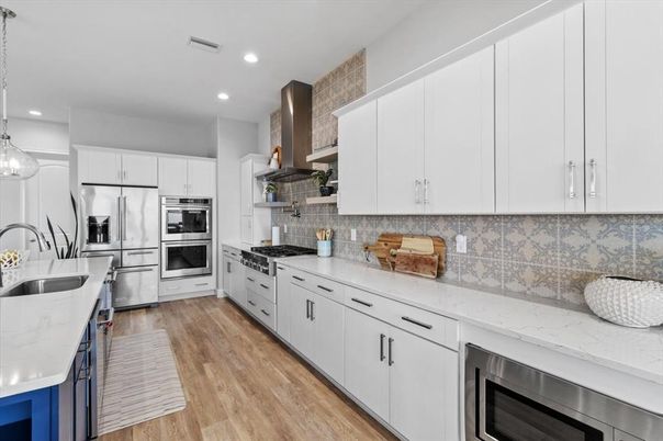 Interior, Kitchen, Pendant Lights, Recessed Lighting, Stainless Steel Appliances, Wood Texture Flooring