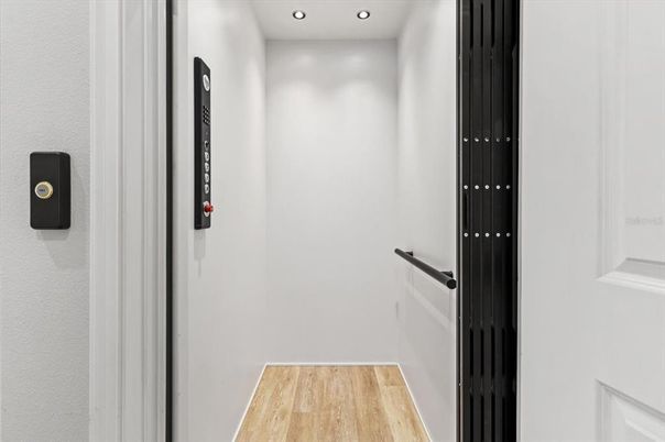 Elevator, Interior, Recessed Lighting, Wood Texture Flooring