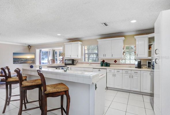 Interior, Kitchen, Recessed Lighting, Tile Countertops