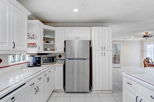 Interior, Kitchen, Recessed Lighting, Tile Countertops