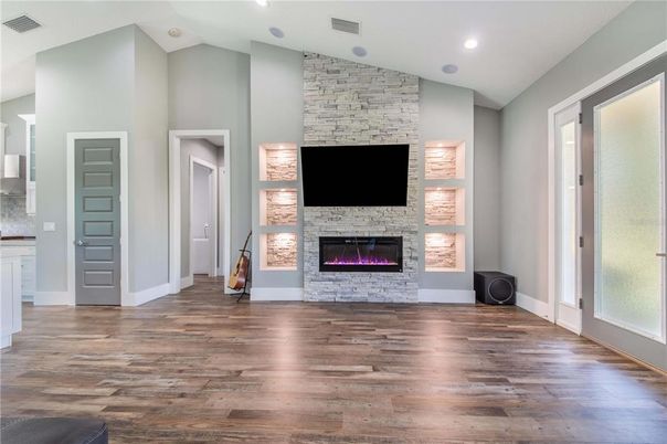 Fireplace, Interior, Recessed Lighting, Stone Walls, Wood Texture Flooring