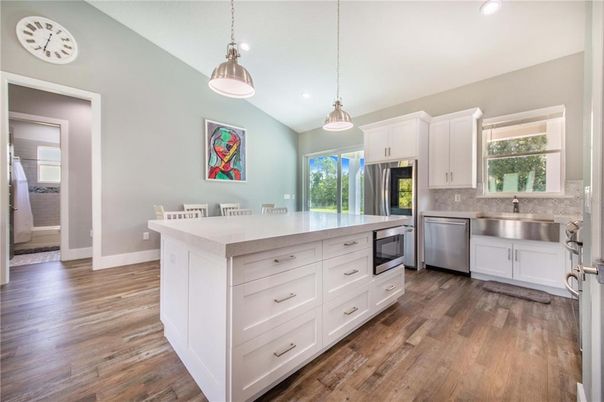 Interior, Kitchen, Pendant Lights, Recessed Lighting, Stainless Steel Appliances, Wood Texture Flooring