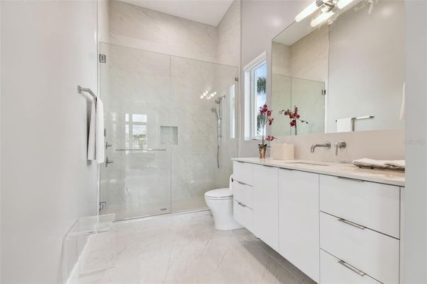 Bathroom, Dual Sink Vanities, Glass Shower, Interior, Marble, Marble Walls