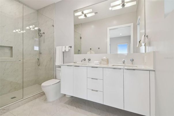 Bathroom, Dual Sink Vanities, Glass Shower, Interior, Marble, Marble Walls
