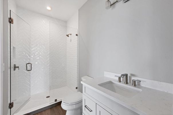 Bathroom, Glass Shower, Interior, Recessed Lighting, Wood Texture Flooring