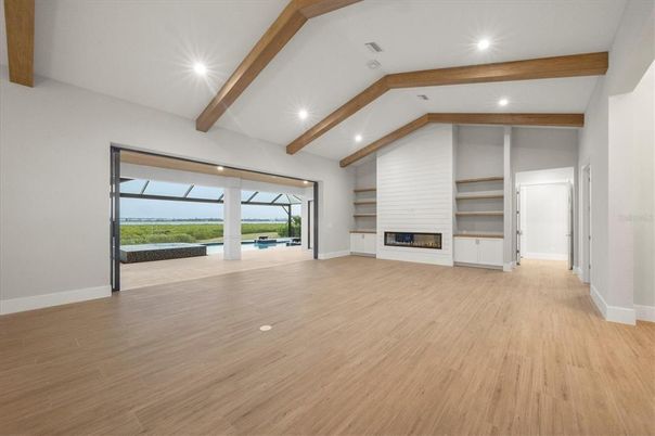 Empty room, Fireplace, Interior, Recessed Lighting, Wooden Beams, Wood Texture Flooring