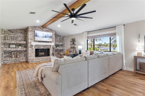 Fireplace, Interior, Living room, Recessed Lighting, Stone Walls, Wooden Beams, Wood Texture Flooring