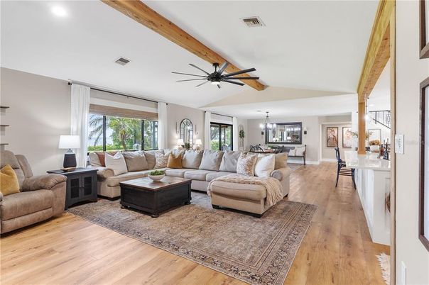 Dining room, Interior, Living room, Pendant Lights, Recessed Lighting, Wooden Beams, Wood Texture Flooring