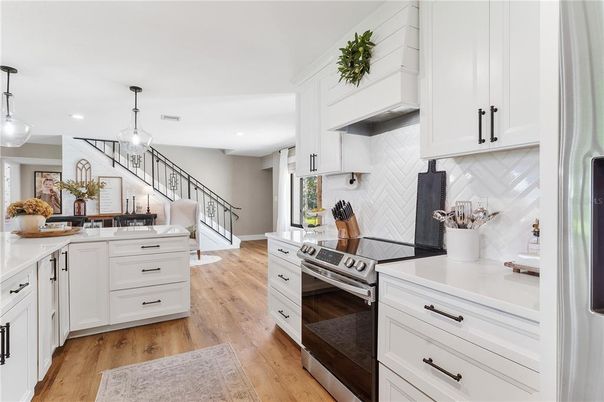 Interior, Kitchen, Pendant Lights, Recessed Lighting, Stainless Steel Appliances, Wood Texture Flooring
