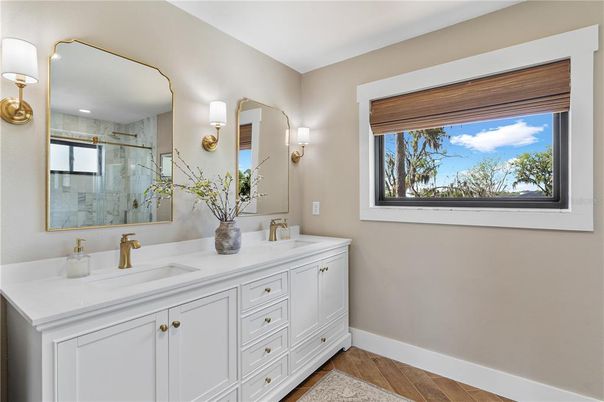 Bathroom, Dual Sink Vanities, Interior, Recessed Lighting, Wood Texture Flooring