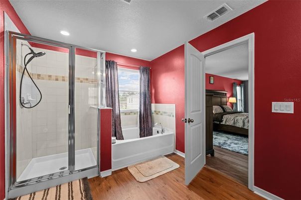 Bathroom, Bedroom, Glass Shower, Interior, Recessed Lighting, Wood Texture Flooring