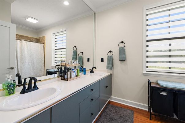 Bathroom, Dual Sink Vanities, Interior, Recessed Lighting, Wood Texture Flooring
