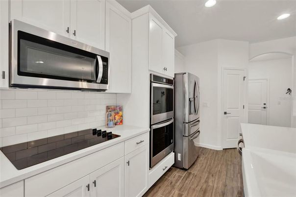 Interior, Kitchen, Recessed Lighting, Stainless Steel Appliances, Wood Texture Flooring