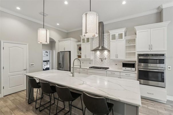 Interior, Kitchen, Pendant Lights, Recessed Lighting, Stainless Steel Appliances, Wood Texture Flooring
