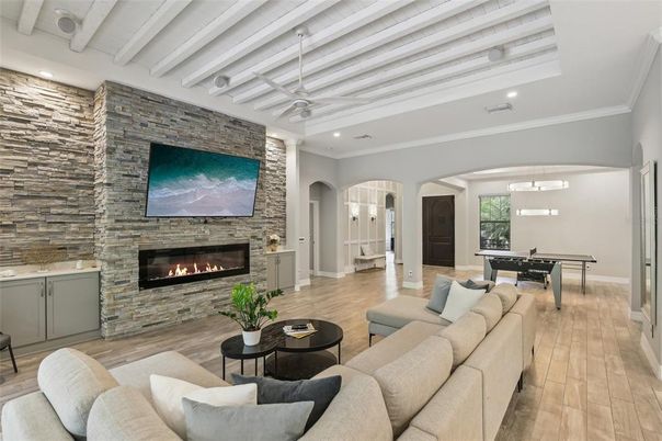Billiard Table, Fireplace, Game Room, Interior, Living room, Pendant Lights, Recessed Lighting, Stone Walls, Wood Texture Flooring