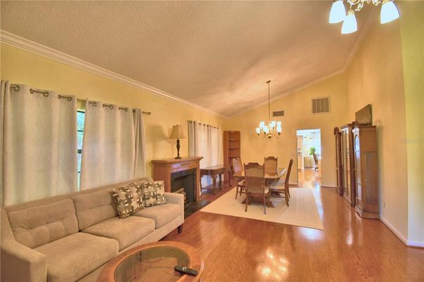 Chandelier, Dining room, Fireplace, Interior, Living room, Wood Texture Flooring