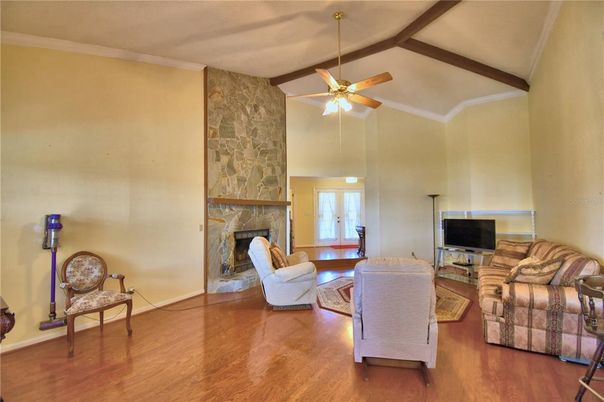 Fireplace, Interior, Living room, Stone Walls, Wooden Beams, Wood Texture Flooring