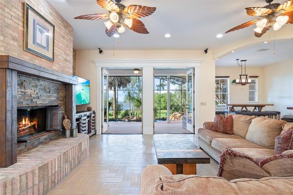 Fireplace, Interior, Living room, Pendant Lights, Recessed Lighting, Stone Walls, Wood Texture Flooring