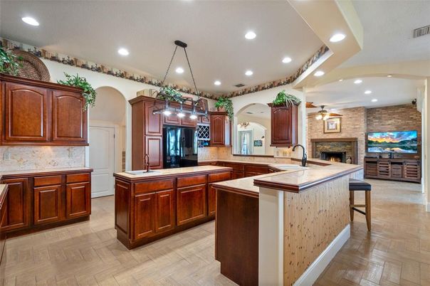 Fireplace, Interior, Kitchen, Pendant Lights, Recessed Lighting, Stone Walls, Wood Texture Flooring