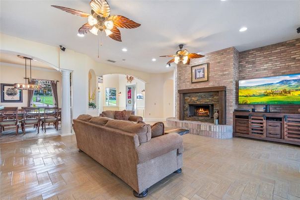 Dining room, Fireplace, Interior, Living room, Pendant Lights, Recessed Lighting, Stone Walls, Wood Texture Flooring