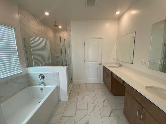 Bathroom, Dual Sink Vanities, Glass Shower, Interior, Marble, Recessed Lighting