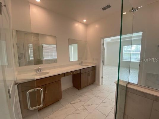 Bathroom, Dual Sink Vanities, Glass Shower, Interior, Marble, Recessed Lighting