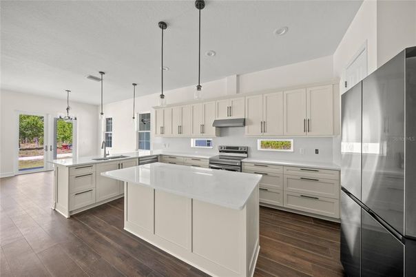 Interior, Kitchen, Pendant Lights, Recessed Lighting, Stainless Steel Appliances, Wood Texture Flooring